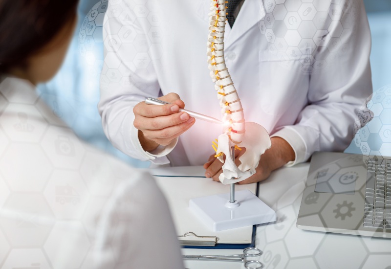 Dr. Salvatore Palumbo is explaining spinal cord compression on Long Island